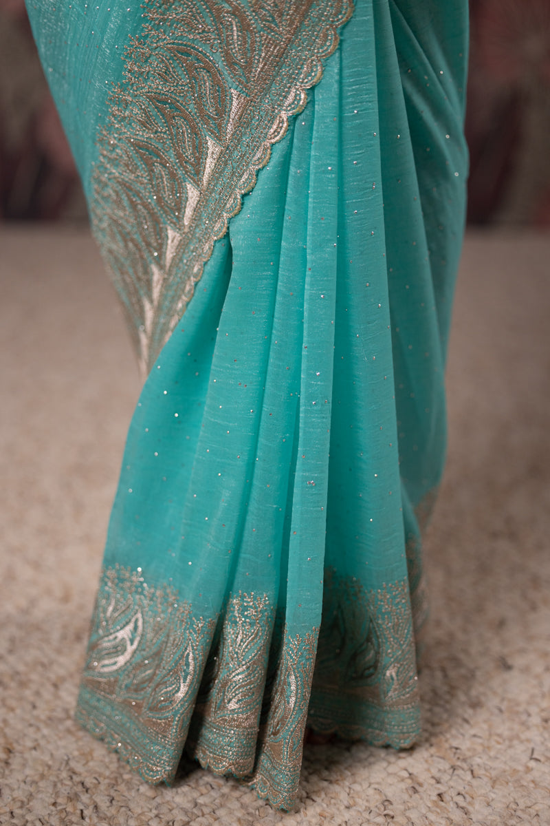Turquoise Embroidered Georgette Saree