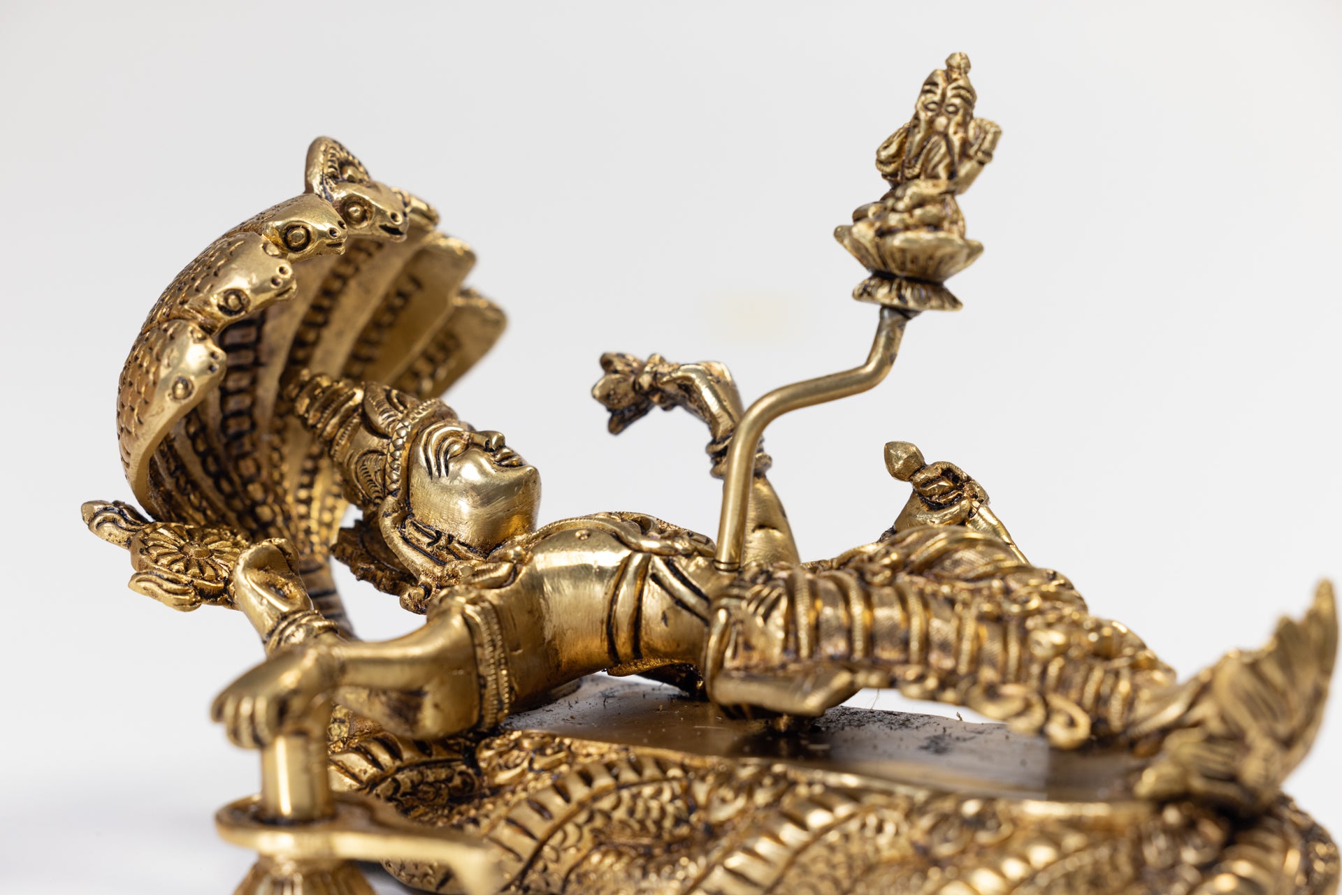 Lord Narayana resting on Adishesha