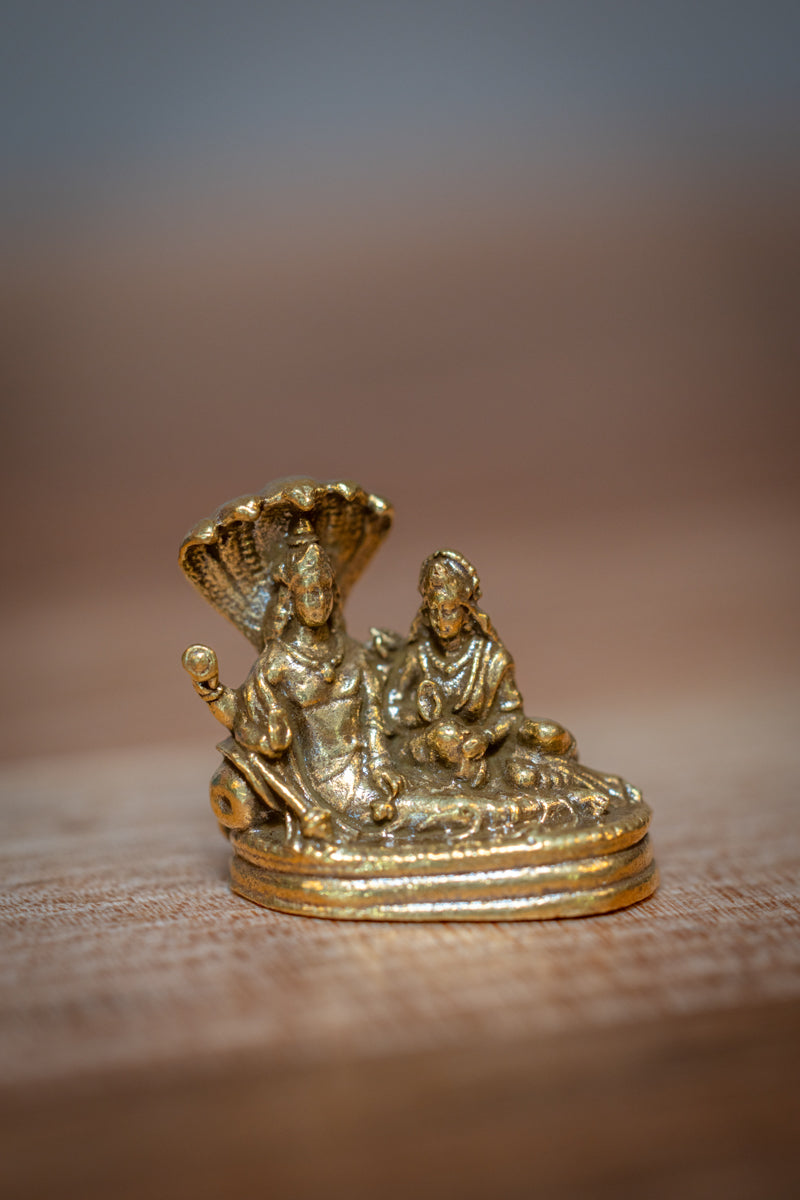 Lakshmi-Narayana seated on Adishesha  - mini murti