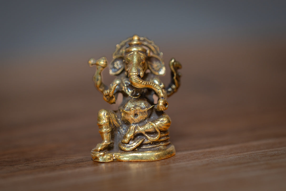 Lord Ganesha sitting - mini murti