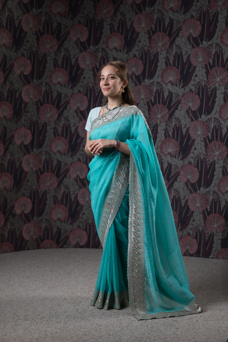 Turquoise Embroidered Georgette Saree