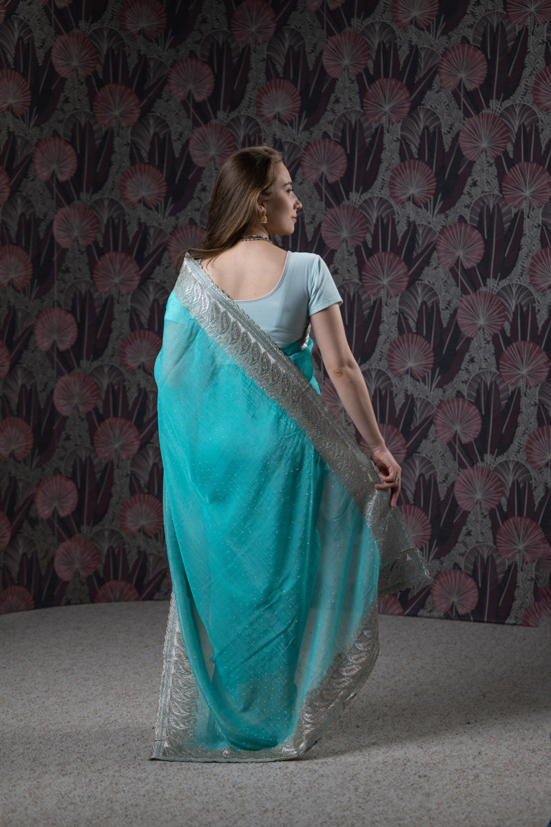 Turquoise Embroidered Georgette Saree